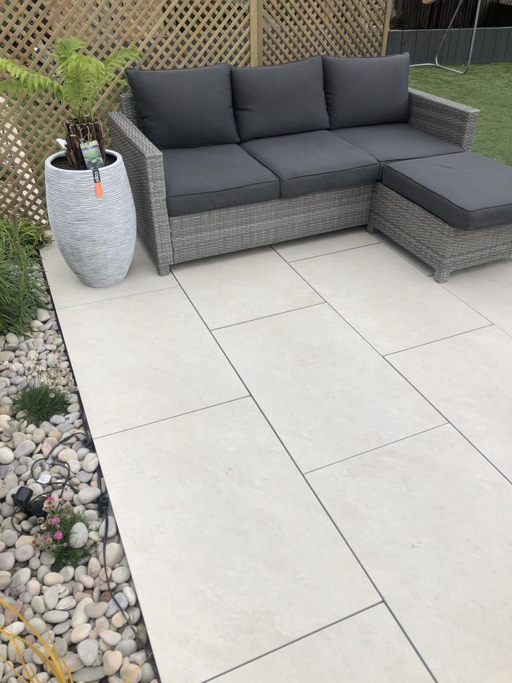Alpine White Paving Slabs β bright, clean porcelain tiles ideal for minimalist outdoor designs.