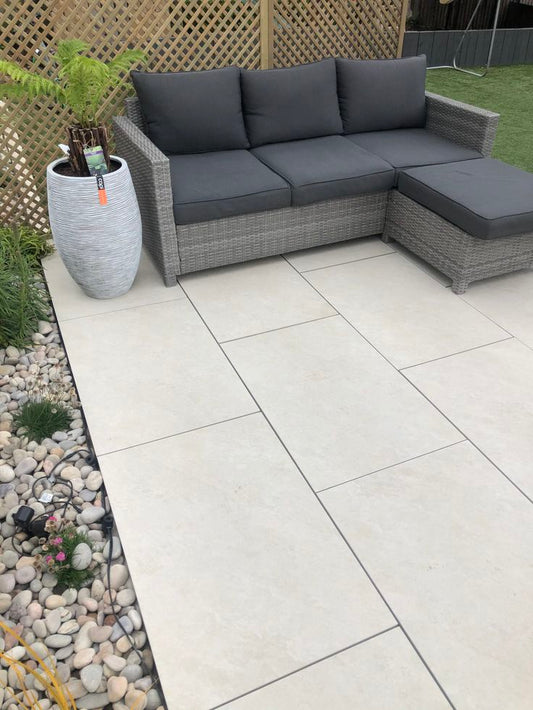 Alpine White Paving Slabs – bright, clean porcelain tiles ideal for minimalist outdoor designs.