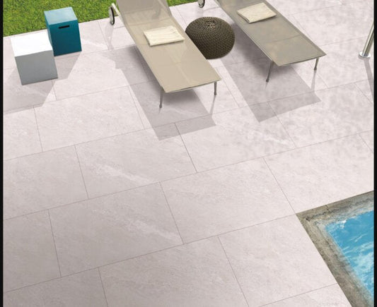 Glacier White Paving Slabs – bright and modern porcelain tiles for elegant patio areas.