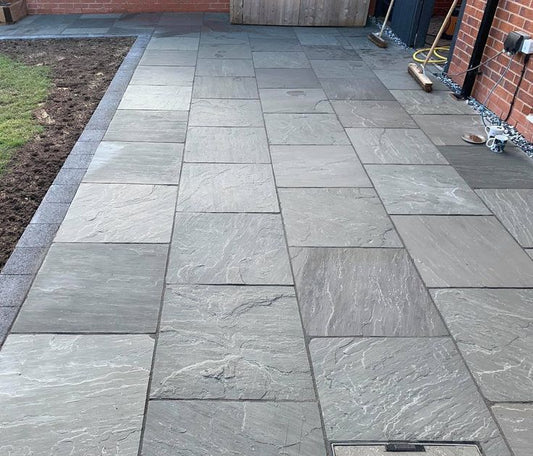 Grey Indian Sandstone Kandla Paving Slabs – cool-toned natural stone ideal for patios and walkways.