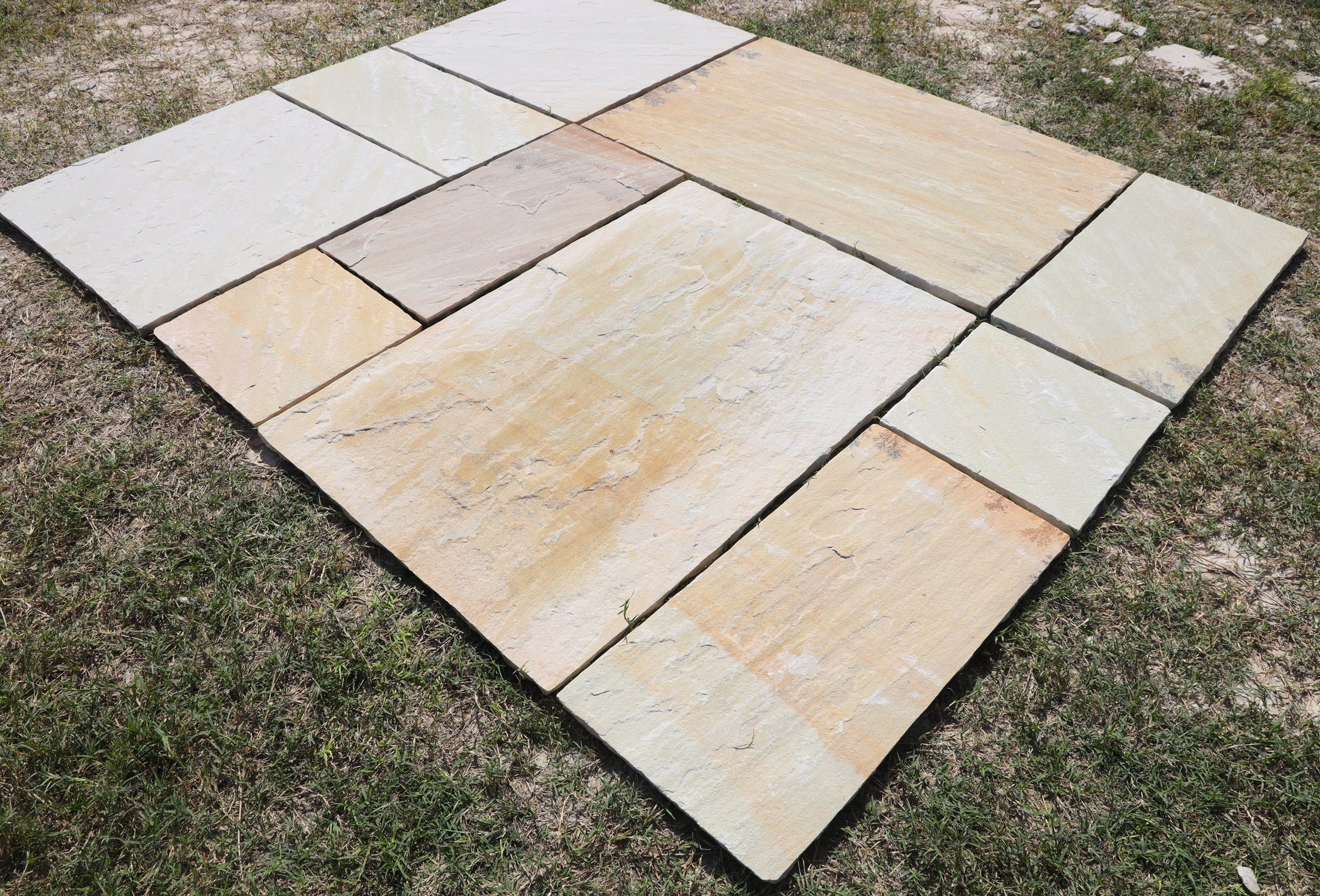 Mint Fossil Flagstone Paving –  indian Sandstone beige-toned slabs with fossil-like patterns for elegant gardens