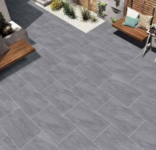 Vintage Silver Paving Slabs – soft silver-grey porcelain tiles with a weathered stone appearance.