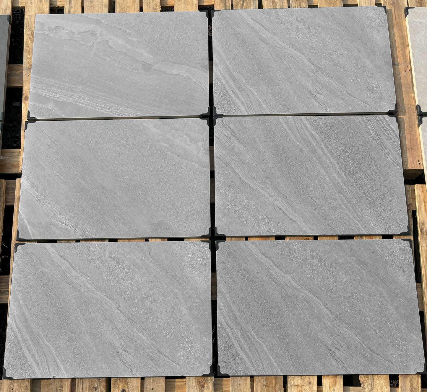 Graphite Grey Paving Slabs – bold, deep-grey porcelain with a sleek, urban look