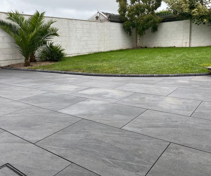 Porcelain Paving in Vintage Silver – stylish aged-look slabs ideal for patios and courtyards.