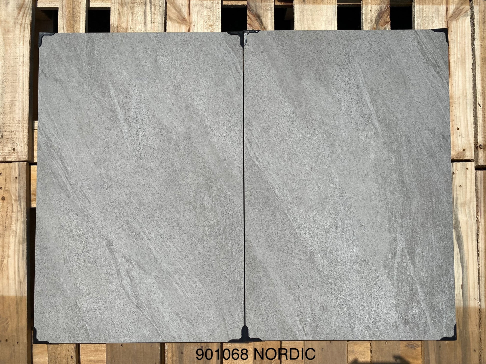 Volcano Grey Paving Slabs – deep grey porcelain tiles with a bold, volcanic stone effect.